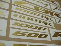 Honda CBR 6001000 RR brushed (scratched) gold logo emblems set